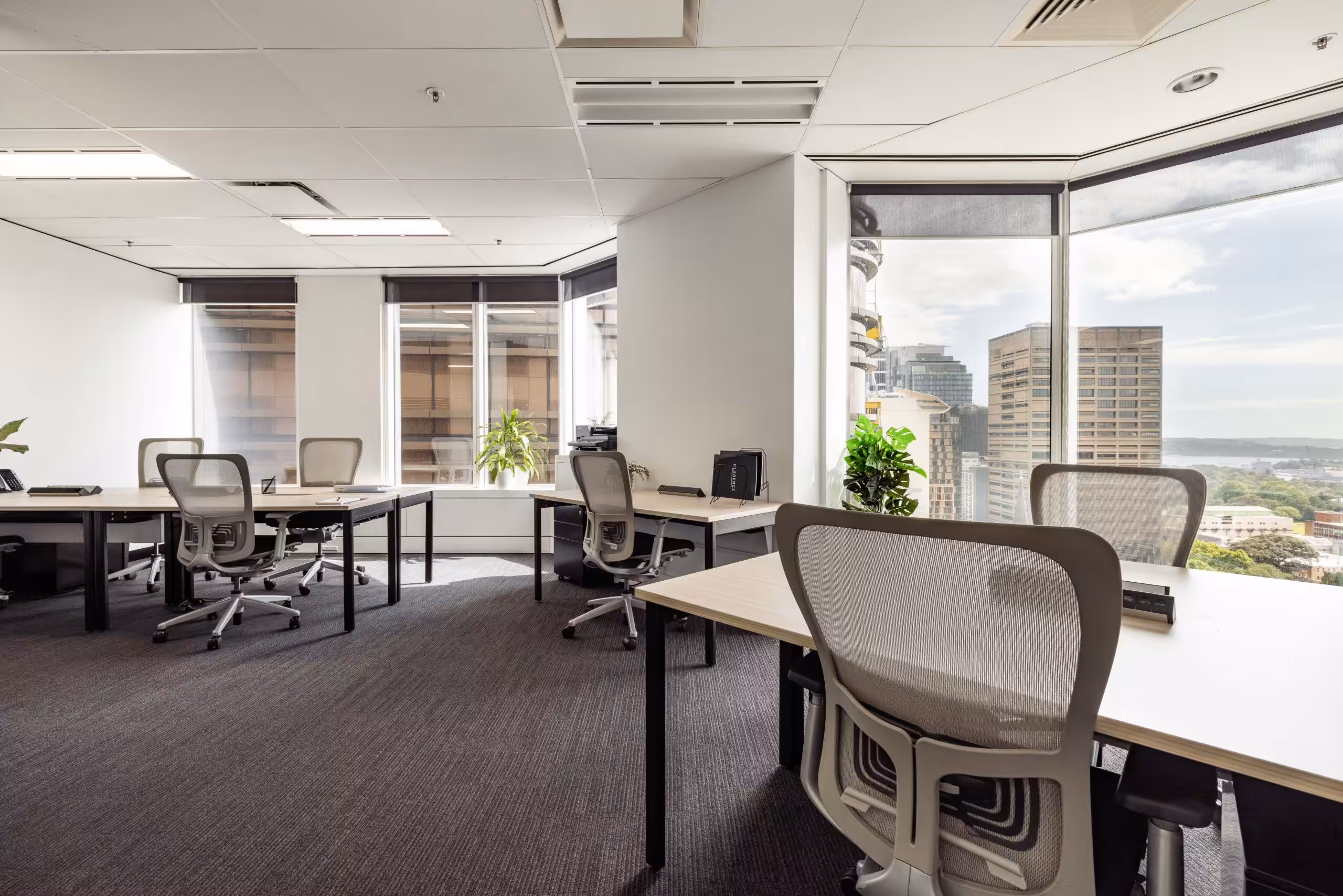 A private office at 133 Castlereagh Street, Sydney, with city views along the window wall
