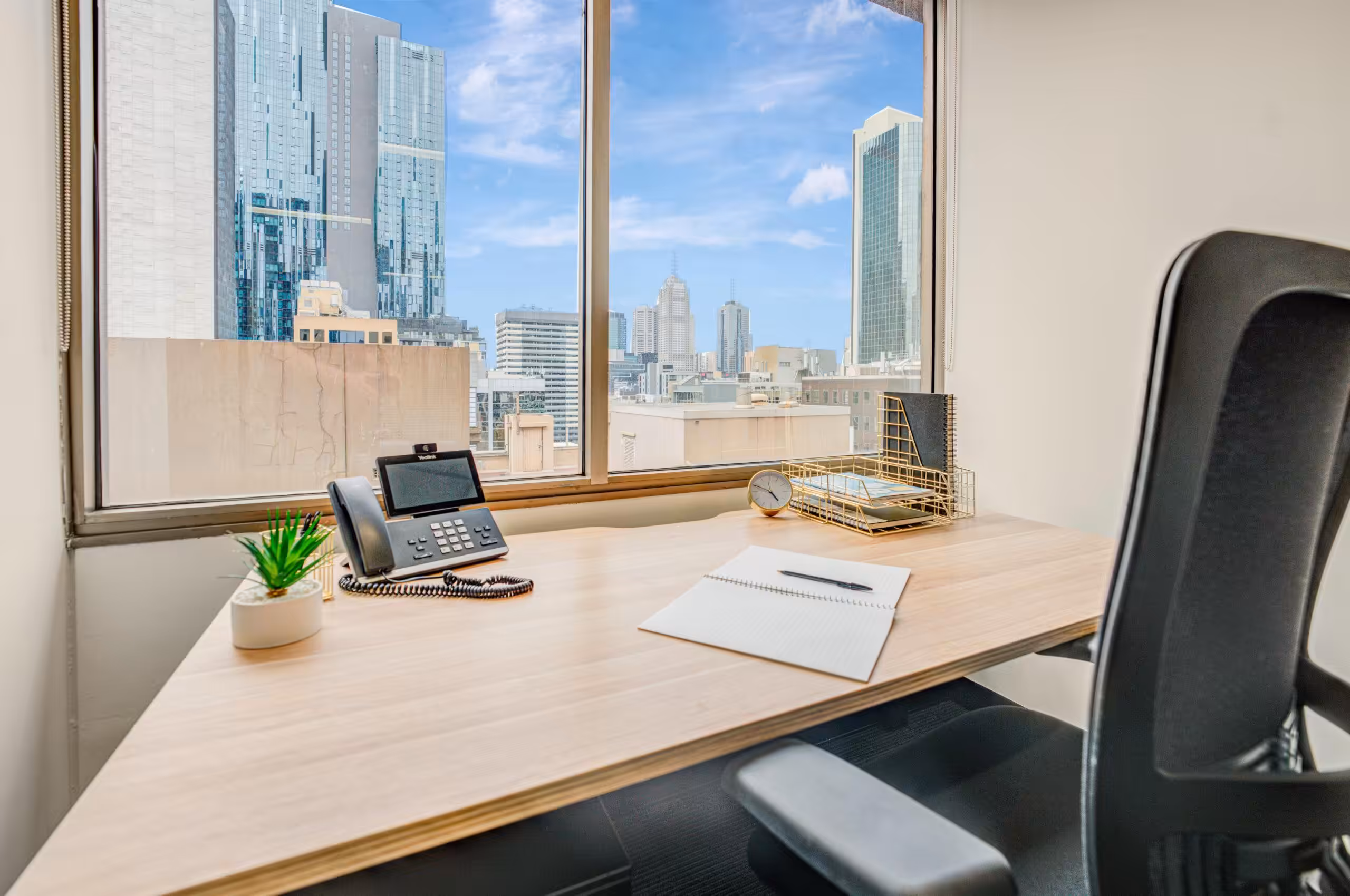 A private office on level 10 at 456 Lonsdale Street, Melbourne, looking north over the CBD
