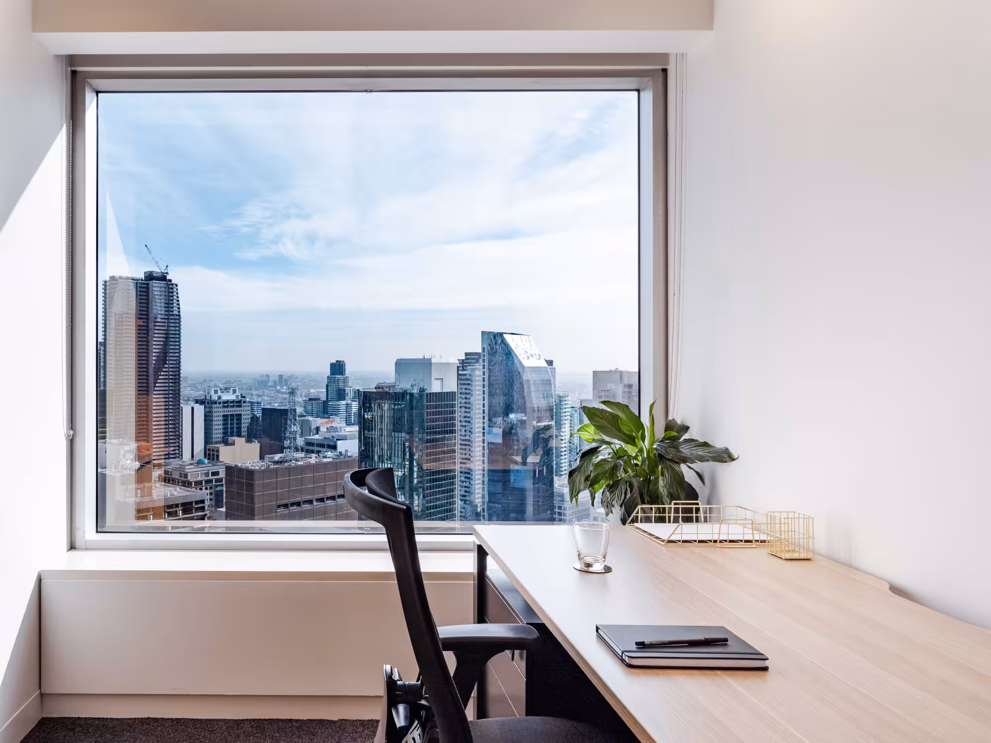 A private office at 385 Bourke Street, Melbourne, looking out over the city